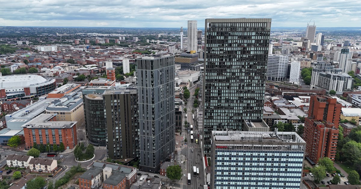 Birmingham city centre skyline at dusk with modern skyscrapers and the Bullring